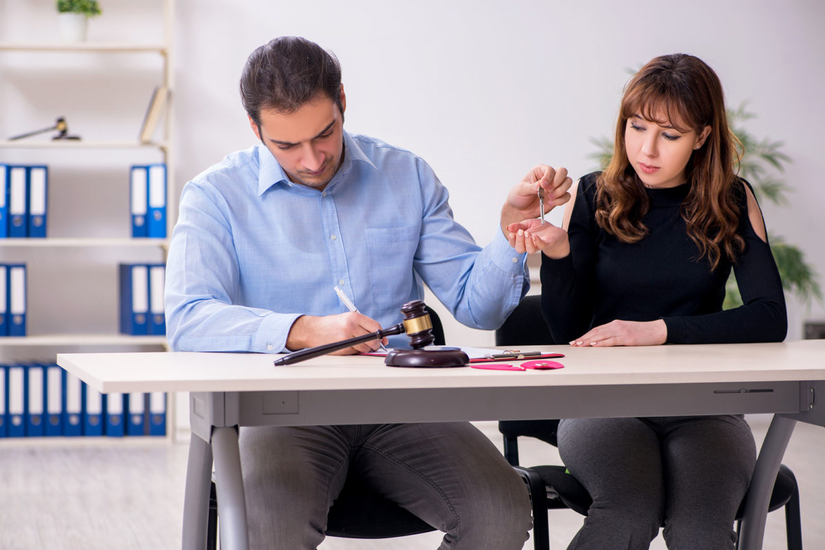 Young pair in a courthouse for divorcing