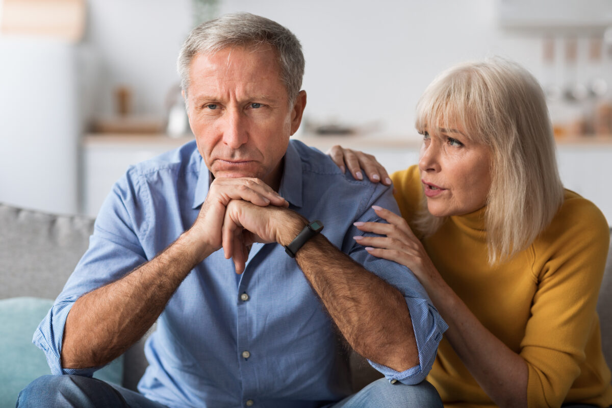 Senior Wife Talking To Indifferent Husband After Conflict